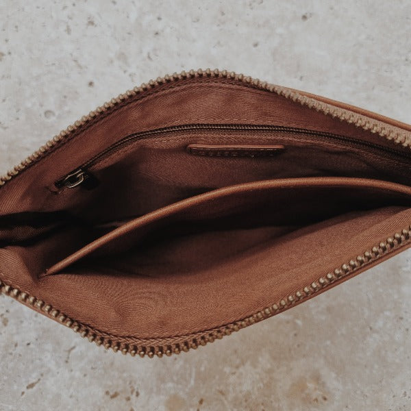 INSIDE VIEW OF BROWN VEGAN LEATHER CLUTCH